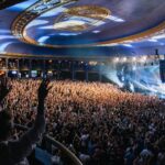 Macklemore Instagram – This tour I have fallen back in love with American venues.  I had forgotten.  They are sacred spaces that hold energy, stories, secrets, sweat, stained walls, beer riddled floors and stages that have been graced by giants who have come and gone.  They are a gathering mecca for the medicine that is music and the magic that occurs in community.  Speakers strapped to the ceiling over the heads of humans pressed up against each other screaming the words in unison.  It has been life affirming to reconnect to this love.  And when I think of venues in America one of my all time favorites is The Rave/Eagles Club in Milwaukee.  It is perfect.  In stature it is a 200,000 sq ft labyrinth, woven in tapestry’s, hidden hallways, lava lamps, a swimming pool, basketball court, an old bowling alley that was converted to a smaller venue and of course the main room.  There is no air conditioning.  It is way too hot.  It is a place where performers will be tested as will the audience, and I revel in the challenge.  The venue is almost 100 years old and is independently owned.  Every time I play there I look forward to hearing stories from the owner Leslie who refuses to sell the place to the bigger companies that have attempted to buy it.  She is a legend, a friend and a magnificent tour guide of the sprawling oasis.  The swimming pool is decorated in graffiti from all the musicians that have stepped foot on this holy ground.  I feel my brother Mac’s spirit in this space, as his eerily beautiful words sit beneath the 25 marker of the pool.  It is truly a 1 of 1 and makes me proud that my fingerprints are part of its linage.  This show marked my 3rd time there and also my 3rd time selling it out.  We gave it 100% as always…It just means something more in Milwaukee ❤️ Milwaukee, Wisconsin