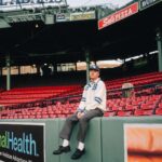 Macklemore Instagram - The minute we pulled up to Fenway Park I got in the spirit. Something about the green and red and how perfect both hues sit next to one another. The line was deep and the energy from the people of Massachusetts was palpable. The Boson accent is one of my favorites in the entire world. I hear it right away and know I’m in my 2nd home. I grew up spending summers in Grafton Massachusetts, playing whiffle ball in my Grandparents backyard and battling the humidity with frequent trips to the pool. We use to drink Polar Orange by the liter and it’s where I was first introduced to Salt and Vinegar Lays which will forever slap. Last night, as all nights playing in Boston, it felt like a homecoming. The MGM at Fenway was maxed out with 2nd cousins, drunk Irish relatives and 5,000 people screaming every word. I love it. My ears and body are definitely feeling the after affects today. But it’s always so worth it. The Boston people have always had my heart. Next stop NYC 🍎 Fenway, Boston, Massachusetts
