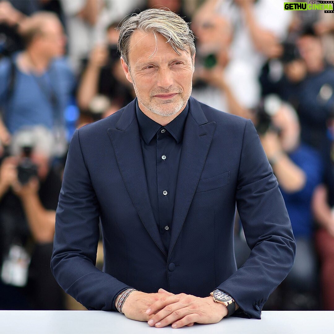 Mads Mikkelsen Instagram - π© REGRAM: @brioni_official From the House of Brioni to yours - On what would have been the week of the 73rd Cannes Film Festival, Brioni looks back at some of its most iconic red carpet moments on the Croisette. - Mads Mikkelsen, 2018 Mads Mikkelsen attended the photocall of the film "Arctic" during the 71st edition of the Cannes Film Festival wearing a wool and silk Brioni bespoke tuxedo and a blue cotton shirt. - #Brioni #MadsMikkelsen #Cannes #TailoringLegends
