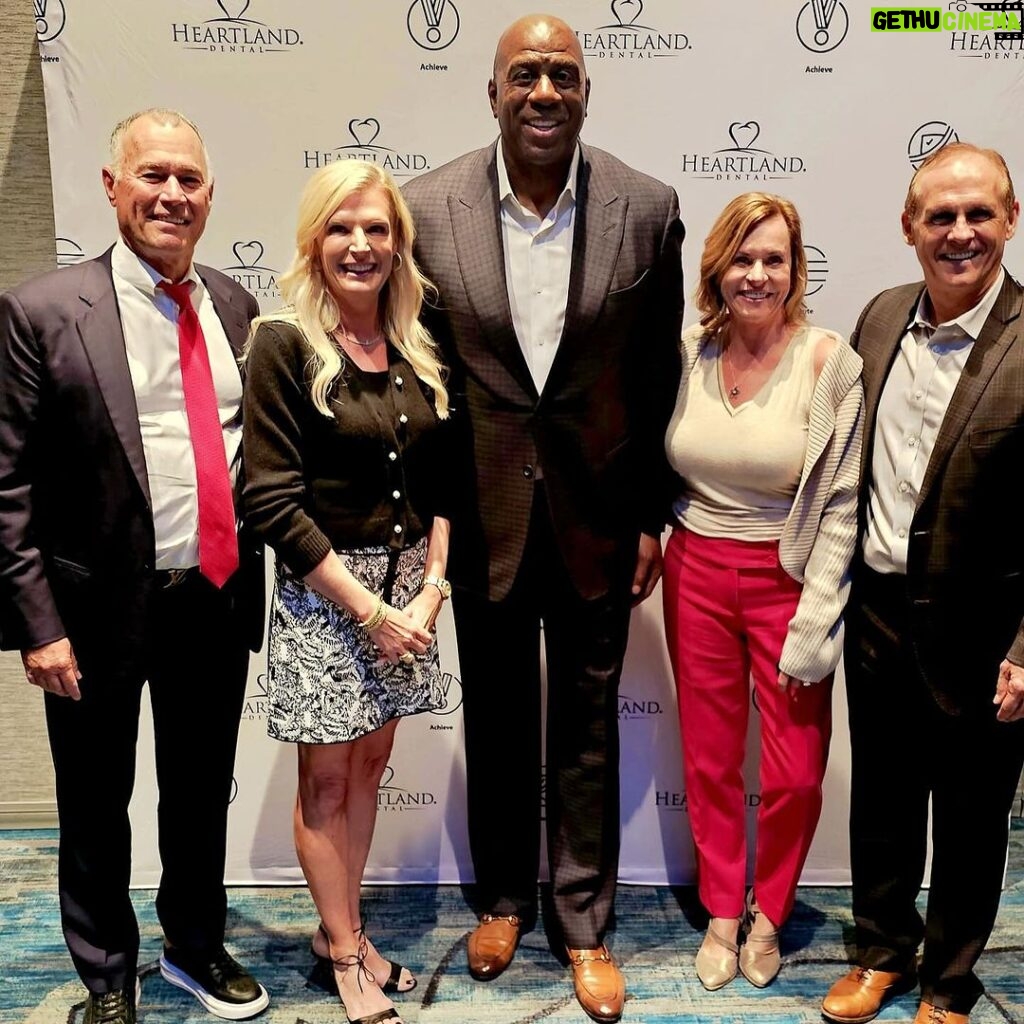 Magic Johnson Instagram - I had such an amazing time at the Heartland Dental 2023 Winter Conference in Orlando, FL this morning! The theme of the conference was “The Power of Us” so I delivered a tailor-made message to the 2,000 doctors in attendance about winning and how leaders make their employees better! Thank you to Heartland Dental Founder and Executive Chairman Dr. Rick Workman, his wife Angie, CEO Pat Bauer, and his wife Gloria for having me today!