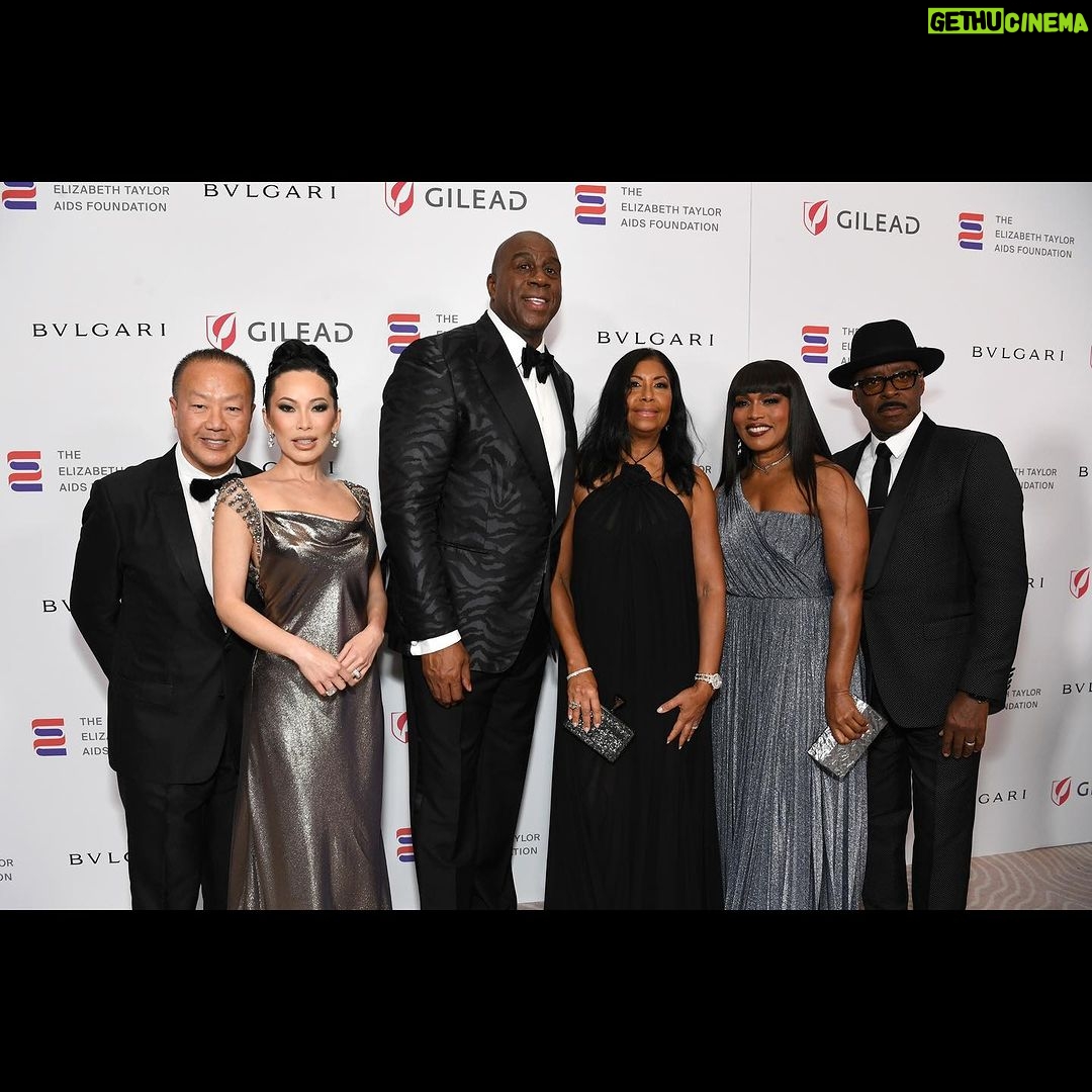 Magic Johnson Instagram - Cookie and I had so much fun last night with all of our family, friends, and business partners at the 4th Annual Elizabeth Taylor Ball to End AIDS! Elizabeth Taylor meant so much to us and we are blessed and grateful that we received the Elizabeth Taylor Commitment to End AIDS Award for our work toward an AIDS-free world. Thank you to the Elizabeth Taylor AIDS Foundation with a special shoutout to Cathy Brown and John Scott for honoring us. Thank you to Chairman & CEO of Presenting Sponsor Gilead Sciences Daniel O’Day for attending the event and presenting us with the award and Diamond Sponsor Bulgari for your generosity. And a special thank you to Former President Barack and First Lady Michelle Obama for their moving and inspirational message for Cookie and I. Thank you for bringing about great change in the world and leading our country! 📸: @gettyimages