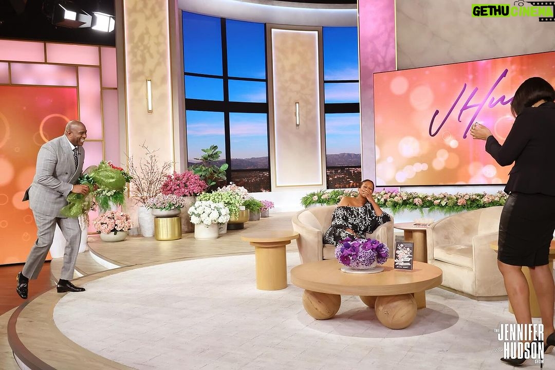 Magic Johnson Instagram - What a touching moment for me to surprise Nicole Avant, daughter of Clarence and Jacqueline Avant, during her interview! The Avant family truly has a special place in my heart, and it was such a joy to give Nicole her well-deserved flowers for the release of her new book, “Think You’ll Be Happy: Moving Through Grief with Grit, Grace, and Gratitude”. 💐