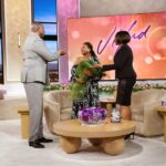 Magic Johnson Instagram - What a touching moment for me to surprise Nicole Avant, daughter of Clarence and Jacqueline Avant, during her interview! The Avant family truly has a special place in my heart, and it was such a joy to give Nicole her well-deserved flowers for the release of her new book, “Think You’ll Be Happy: Moving Through Grief with Grit, Grace, and Gratitude”. 💐