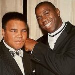 Magic Johnson Instagram – My father and I would listen to all of Muhammad Ali’s fights on the radio when I was younger. I’m still shocked that one of my childhood heroes and favorite athletes became one of my good friends because there’s no one like Muhammad Ali. To be stripped of his heavyweight title, sentenced to time in prison, and exiled from boxing for three and a half years…and then come back, reclaim the heavyweight title in 1974 against George Foreman, and be BETTER than he was before is unheard of!! His strength, dedication, and passion showed both in the ring and in the community. He is a world icon. I’ll never forget watching him carry the Olympic torch and light the cauldron in the ’96 Olympics in Atlanta. Knowing everything he overcame during his career made it an even more emotional moment for me. 
 
Out of all our memories, what will always stand out to me was when Muhammad Ali told me to meet him in Chicago to tell me he wanted me to be more than just a basketball player. It challenged me to think beyond the court. Seeing his activism and advocacy for the good of humanity and the underserved with Nelson Mandela, Malcolm X, Dr. Martin Luther King Jr., US presidents, and more inspired me to create real change. It’s those moments and impact that cement him as my G.O.A.T. and will keep his legacy alive forever!!