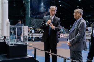 Mahathir Mohamad Instagram - I was invited to visit the Japan Aerospace Exploration Agency (JAXA) in Tsukuba, about 50km from Tokyo, recently.

The Japanese have been studying and experimenting space exploration for quite some time. Starting with small rockets, they have now  progressed and are participating in the manning of the International Space Station (ISS) together with Russians and Americans. 

They carried out experiments and send rockets into space on behalf of other countries. The UAE, for example, decided to explore space and commissioned JAXA to launch their rocket. 

The visit and exhibition was very interesting. It showcased space satellites that had been launched. Because it was full size, including the capsule where the astronauts live, you are able to physically imagine these astronauts’ living condition. 

The space station is quite big about 8 feet in diameter so they can walk about inside the space ship without suits because the climate inside is the same with that of earth.

But if they need to go out to do some maintenance work or something outside, they need to wear the space suit. 

The space suit of course has got provisions for supplying oxygen for them to breathe. 

I asked the President of JAXA, Dr Hiroshi Yamakawa and his team several questions. One of which is about the debris in outer space. Today there are about 50,000 debris in space which is actually orbiting the earth. I wanted to know whether it has any effect on our climate or not. There is no claim that it is affecting the climate.

Beyond that, I wanted to know how they can send a rocket into space and actually docks at the Space Station. Because the Space Station cannot be seen with the naked eye. Even with the telescope, it is difficult to see, but the space capsule carrying the astronauts can actually dock the ISS.
