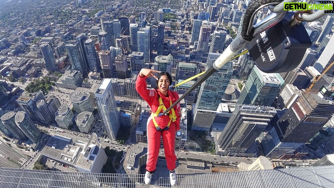 Maitreyi Ramakrishnan Instagram - throwback to when I came home to Canada and the first thing I did was go with @planinternational @plancanada to do the CN tower edge walk. I loved seeing this beautiful view that also included seeing all the traffic I’d have to deal with on the way home😐😂