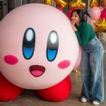 Maitreyi Ramakrishnan Instagram - Well I met my hero and I was NOT disappointed. I got to celebrate the release of Kirby’s Return to Dream Land Deluxe which is now available on the Nintendo Switch with Kirby himself! This was the best surprise ever!💗🍭⭐️ For real though, this surprise was super thoughtful. Thank you #nintendocanada so much. I am truly grateful for all the thought and effort that went behind this day. Young me would never believe that this would be my life😭💖⭐️ #nintendo #nintendoswitch #kirby #gifted