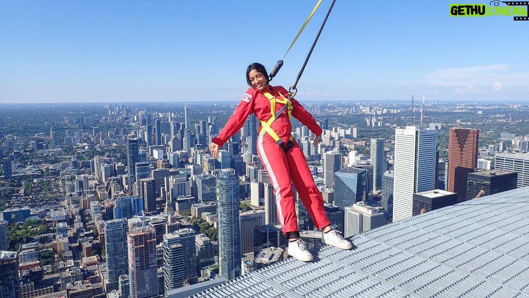 Maitreyi Ramakrishnan Instagram - throwback to when I came home to Canada and the first thing I did was go with @planinternational @plancanada to do the CN tower edge walk. I loved seeing this beautiful view that also included seeing all the traffic I’d have to deal with on the way home😐😂