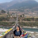 Malavika Mohanan Instagram - Crossing over to the other side of this enchanting valley on what is Bhutan’s longest suspension bridge 🐉🇧🇹 P.S how marvellous are the fluttering prayer flags right?