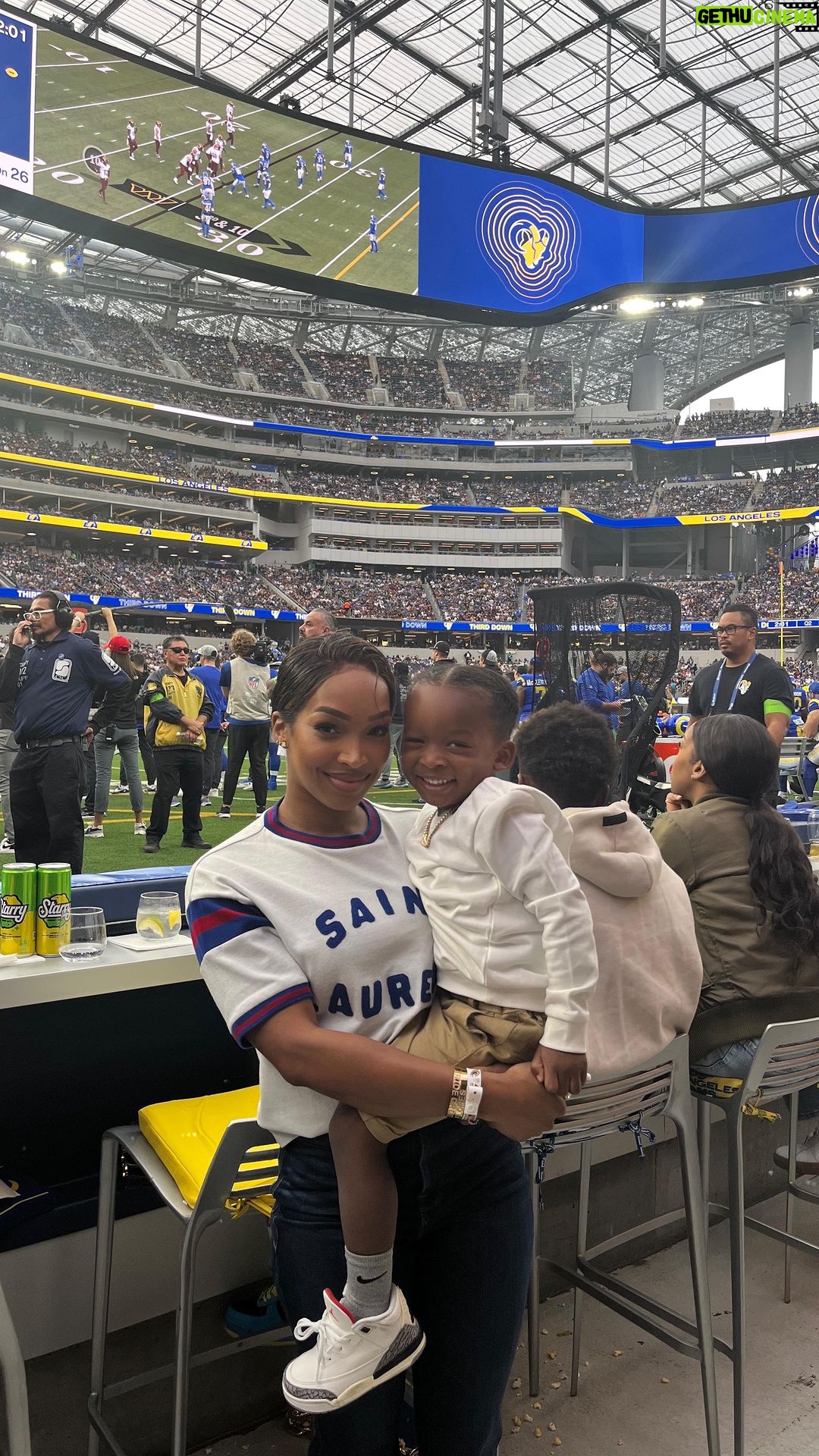 Malika Instagram - Christmas Break has officially begun. It’s giving take your son(s) to their 1st football game and @foreverkhadijah and I are so happy that we did. Thank you @rams for the best time! #ramshouse
