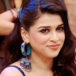 Mannara Instagram - My smile is my ultimate accessory – radiant, infectious, and always in style 🫶🏻🧨 Styled by @mitalihandaofficial Outfit @meenabazaar_official Earrings @thejewelfactory_india @rimadidthat #Mannarachopra #BB #BB17 #BiggBoss17 #Smilealways #BiggBoss #NewPics #Mannara #TuesdayVibes India