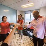 María Gabriela de Faría Instagram - I’m very happy and can’t shut up about it so here’s a compilation of moments after I found out @jamesgunn had invited me to play Angela, The Engineer. 1) I immediately bought a Superman cape at Party City. 2)Surprised my agent at his office with his own cape and champagne. 3-4) My Godmothers got pretty excited and we all pretended to fly. 5) I sent my parents a Superman action figure to Venezuela and that’s how I let them know I got the role. Don’t mind my dad’s words, he loves me. 6) They proceded to send me all of the gifts available with a Superman theme. 7) I walked around town with the Party City cape like a child after a birthday party. 7) Angie ❤️ • • • Estoy muy feliz y no se me quita, así que aquí hay una recopilación de momentos después de que @jamesgunn me invitara a interpretar a Angela, The Engineer. 1) Inmediatamente compré una capa de Superman en Party City. 2) Sorprendí a mi agente en su oficina con su propia capa y champaña. 3-4) Mis Madrinas se emocionaron mucho y por un rato jugamos a que Catha volaba. 5) Le envié a mis papás una figura de acción de Superman a Venezuela y así les hice saber que conseguí el papel. No le hagan caso a las palabras de mi papá, él me ama 🤣 6) Mis papás procedieron a enviarme todos los regalos disponibles con temática de Superman. 7) Caminé por la ciudad con la capa de Party City como un niño después de una fiesta de cumpleaños. 7)Angie❤️