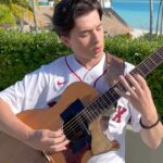Marcin Patrzalek Instagram - Working on new stuff, here’s a throwback 🌴 #guitar #beethoven