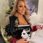 Mariah Carey Instagram - 🎶 Living like Babs cause it’s Evergreen 🎶 Reading the incredible memoir by @barbrastreisand on the tour bus!📕❤️ Thank you for the gift and the fabulous dedication @billyeichner 💋