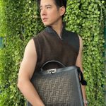 Mario Maurer Instagram - A new interpretation of the icon 💼🖤 #FendiPeekaboo @fendi