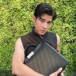 Mario Maurer Instagram - A new interpretation of the icon 💼🖤 #FendiPeekaboo @fendi