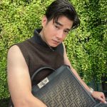Mario Maurer Instagram - A new interpretation of the icon 💼🖤 #FendiPeekaboo @fendi