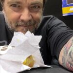 Mark Sheppard Instagram - Had so much fun @walescomiccon Got to hang out with this talented b**tard @scandalous_13 talk football and eat the ridiculously amazing @thedoughnutwhispereruk Boston Cream Doughnut. It’s Vegan. I’m not Vegan. Unbelievably good.
