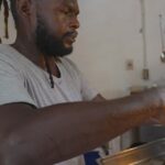 Mark Wiens Instagram - Bayleaf smoked fish + breadfruit oil down! Such a good meal combintation in #Toco #Trinidad @booktrinidad @totallytoco @foodietaleswithzaak