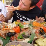 Mark Wiens Instagram - Aunty Kay’s giant lobsters 🦞 seafood mountain in Toco, Trinidad! @totallytoco @foodietaleswithzaak @booktrinidad #visitTrinidad Trinidad and Tobago