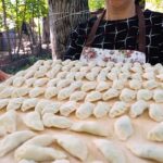 Mark Wiens Instagram - Insanely tasty lamb dumplings in the mountains of northern Azerbaijan - the sour plum garlic sauce, made them so addictive! Thanks to @reazerbaijan @adnanhuseynn #Azerbaijan #dumplings #ReAzerbaijan