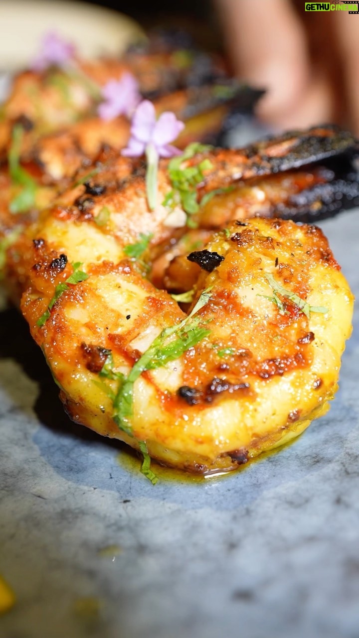 Mark Wiens Instagram - Incredible “tandoori prawns 🦐 “ at @punjabgrillbangkok that drizzle of butter! #IndianFood #Bangkok Punjab Grill Bangkok