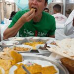 Mark Wiens Instagram - Emirati breakfast feast with @theminoritytaste Don’t miss “Mr. Ali’s favorite breakfast,” a delicious scramble of tomatoes and eggs. #Dubai @arabianteahouse #EmiratiFood Arabian Tea House