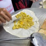 Mark Wiens Instagram - Legendary Roti Pa Day (โรตีมะตะบะป้าเด), who has been making roti for over 39 years. She fries in pure coconut 🥥 oil, no palm oil or margarine. Loved her sweet roti and mataba (stuffed with a mild curry potato egg mixture). #Legend #StreetFood #ChiangMai #Thailand โรตีป้าเด สาขาไนซ์บาซ่าร์