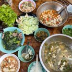 Mark Wiens Instagram - Amazing meal with a Lisu Hill-tribe family. Khao raem fuen (ข้าวแรมฟืน), basically rice jelly, cut into chunks and made two ways - one with tomato 🍅 and minced pork, another served cold with pickled mustard greens 🥬. 📍 Many thanks to Lisu Lodge @asian_oasis #ChiangMai #Thailand #Lisu #villagefood