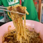 Mark Wiens Instagram - Tasty bowl of Northern Thai curry with egg noodles and fall apart tender beef. Garnish with shallots, pickled mustard greens, and fried chili paste 🌶 📍 ร้านข้าวซอยปรินส์ (Khao Soi Prince) ร้านข้าวซอยปรินส์ ฮาลาล