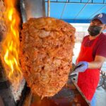 Mark Wiens Instagram - Tacos al pastor with @mexi_papa_adventures Amazing family run taqueria, serving some of LA’s best al pastor 🌮 🔥 @el_taco_grande2 #LosAngeles #MexicanFood El Taco Grande