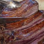 Mark Wiens Instagram - One of the greatest carne asada taquerias. The ribs are grilled, SHAVED 🪒 off the bone, chopped, and added to your taco 🌮!! Best of the best #Tucson #Arizona #tacos #MexicanFood @benniebustamante