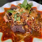 Mark Wiens Instagram - @northernthaifoodclub Best Thai food I’ve ever had outside of Thailand - specifically northern Thai food. Nam ngiaw (น้ำเงี้ยว) tomato stew over noodles, tam kanun (ตำขนุน) young jackfruit salad, and aeb pla duk (แอบปลาดุก) a packet of catfish and spice paste, all on point. When you’re in #LosAngeles real deal northern Thai food. #ThaiFood #LAfood Northern Thai Food Club