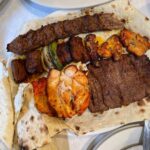 Mark Wiens Instagram - Persian food tour with @gooshtlovers It was a honor to have a huge Persian banquet sized lunch @raffisplace with Mr. and Mrs. Raffi. When they opened their restaurant 28 years ago, they had 4 tables. Now it’s one of the biggest and best Persian restaurants in the United States! #PersianFood #Iran #kebab #koobideh #LosAngleles Raffi's Place