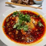 Mark Wiens Instagram - Sichuan food tour with @jingtheory - she took me to one of her favorite restaurants @chengduimpression outstanding flavors and balance, perfect use of chili 🌶 oil, Sichuan pepper, and the umami of doubanjiang. Jing also is the founder of one of the best chili oils you can get @flybyjing! #LosAngeles #SichuanFood #ChineseFood Chengdu Impression