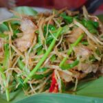 Mark Wiens Instagram - Thailand’s Hidden Dishes! 🇹🇭 #1 Pork fried with garlic chive roots (หมูผัดรากชู), an Akha hill tribe speciality in Chiang Rai! @tourismthailand #ChiangRai #thailandshiddendishes Chiang Rai, Thailand
