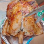 Mark Wiens Instagram - Tried this chicken stuffed with glutinous rice and ginseng, rotisserie roasted over fire! 🔥 With kimchi it was amazing! #Seoul #KoreanFood Hannam
