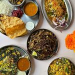 Mark Wiens Instagram - Amazing Indian street food dishes and chaats @chaipani Highlight for me was the kheema pav (minced lamb and spices with chutney) and the dahi puri (puri shells filled with potato, chutney and yoghurt). @meherwanirani #IndianFood #chaat #Asheville #NorthCarolina Chai Pani