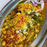 Mark Wiens Instagram - Amazing Indian street food dishes and chaats @chaipani Highlight for me was the kheema pav (minced lamb and spices with chutney) and the dahi puri (puri shells filled with potato, chutney and yoghurt). @meherwanirani #IndianFood #chaat #Asheville #NorthCarolina Chai Pani