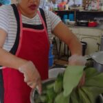 Mark Wiens Instagram - Welcome to Fiji 🇫🇯 She’s making rourou (taro leaves) cooked with mutton, one of the staples of Fijian food., with @andhy_blake Thanks to @fly_fijiairways @captaincookfiji #Fiji #FijianFood