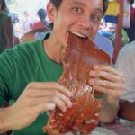 Mark Wiens Instagram - That crispy skin! Eating a 3 kilo chunk of lechon in Cebu with @stanlyonmedia 📍 Ruthy’s Lechon #Talisay #Cebu #FilipinoFood