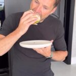 Mark Wright Instagram - HEALTHY HIGH PROTEIN CHICKEN BURGER. 🍔🥬 Can’t tell you how good this one is! Like a takeaway but not greasy at all and you feel great afterwards. Ingredients (makes 4 big burgers)👇🏼 For the burgers: - Chicken mince 500g - 1 Onion finely chopped - 1 tsp Garlic Powder - Salt & Pepper - 1 Egg - Couple of teaspoons of flour For the crispy coating: - 1 Egg white - 60g Cornflakes - 1/2 tsp Garlic Powder - 1/2 tsp Onion Granules - 1/2 Celery Salt - 1 tsp Paprika - Pepper to taste The rest: - Light mayo - 1 tsp Lemon juice - Grated lemon zest - Brown seeded buns - Shredded lettuce Method: 1. Add your burger ingredients into a large bowl (apart from the flour) then use your hands to mix thoroughly. Coat your hands in some flour then shape into burger patty shapes. It can get quite sticky so use the flour to help with this - a good technique is to sort of throw the meat from one hand to the other till the shape forms. 2. Crush the cornflakes into a medium crumb then add your herbs and seasoning and spread onto a plate. In a shallow bowl have your egg white then dip each burger into the egg then crumb mixture. 3. Air Fry for 15 minutes (check they are totally cooked through). 4. While your burgers are cooking add lemon juice, zest and black pepper to some light mayo. 5. Load up your burgers and enjoy!