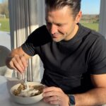 Mark Wright Instagram - Apple crumble… but make it healthy🍏🥥🍯 Loads more recipes like this on @_livewright_ Ingredients: Filling: 5 Granny Smith apples, peeled and chopped into bitesize chunks 1 tablespoon sugar 1 tablespoon corn starch ½ teaspoon ground cinnamon Topping: 2 cup rolled oats 1/2 cup almond flour 1/2 cup chopped walnuts or pecans 1tsp ground cinnamon 1/2 tsp ground ginger 1/2 tsp fine sea salt 1/3 cup maple syrup 1/3 cup coconut oil, melted, plus more for baking dish Honey, coconut yoghurt or ice cream to serve Method: 1. Preheat the oven to 180C. Smear a little of the coconut oil in a baking dish. 2. In a large bowl, toss together the apples, sugar, corn starch, and cinnamon. 3. Pour the apple mixture into the baking dish. 4. In the same bowl as you made your apples add the oats, almond flour, nuts (if using), cinnamon, ginger, and salt. Add the maple syrup and coconut oil and rub together until it looks like a crumble consistency . 5. Spread the oat topping evenly over the apples then make for 30 minutes or until the top is golden. This makes the apples soft but not a sauce, cook for longer if you’d prefer a saucy consistency.
