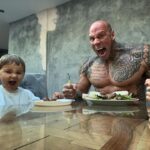 Martyn Ford Instagram - Like Father, like Son …. He’s definitely gonna be like his Daddy when he’s older 😂 … Steak and rice cakes for breakfast before nursery 😂 … beats coco pops or cornflakes for sure ❤️👊 …. #food #breakfast #monster