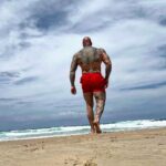 Martyn Ford Instagram - A much needed stroll around the beach after what was an intense 2 hour session this am, now … after food and a Power Nap …. We go again !!! Remember, YOU control YOUR TOMORROW. But it’s upto you, to do what’s uncomfortable, to push harder, to dream bigger, to want more … NO ONE ELSE CARES, NO ONE ELSE WILL DO IT FOR YOU … AND no one else can feel the JOY when you achieve your dreams in the same way YOU WILL #dream #apply #consistency Australia