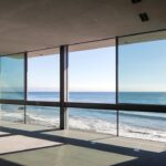 Mary Fitzgerald Instagram – 🏠 🌊 Coming Soon in Malibu – 24844 Malibu Rd. – $53,000,000

An architectural tour de force and only one of the few private homes in the United States designed by the renowned Pritzker Prize-winning Japanese architect, Tadao Ando. Best known for his minimalist structures and his assured use of reinforced concrete, Ando’s trademark design of “smooth-as-silk” concrete is wholly present in the structure and surface of the home. Constructed of approximately 1,200 tons of concrete, 200 tons of steel reinforcement, and 12 massive pylons driven more than 60 feet into the sand with AD100 architecture firm Marmol Radziner acting as executive architect and general contractor, the structure is an everlasting beacon of permanence on California’s coastline. Natural light is used creatively throughout the space, another signature of Ando, to manipulate a warm feeling throughout the building and harmonize with its natural surroundings. The home spans +/- 4,000 sq. ft. of interior space and approximately 1,500 sq. ft. of outdoor decks with ocean views from every room. Currently all interior finishes have been removed from the property, and work is needed to either restore or reimagine the interiors. Thoughtfully located on the prestigious and quiet Malibu Road, with easy access and close proximity to the finest restaurants, shopping, and entertainment in all of Malibu. An exceedingly rare architectural achievement that should be seen as a masterful work of art, rather than just a residence.

Listing Agent: @jasonoppenheim @theoppenheimgroup