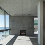 Mary Fitzgerald Instagram - 🏠 🌊 Coming Soon in Malibu - 24844 Malibu Rd. - $53,000,000 An architectural tour de force and only one of the few private homes in the United States designed by the renowned Pritzker Prize-winning Japanese architect, Tadao Ando. Best known for his minimalist structures and his assured use of reinforced concrete, Ando’s trademark design of “smooth-as-silk” concrete is wholly present in the structure and surface of the home. Constructed of approximately 1,200 tons of concrete, 200 tons of steel reinforcement, and 12 massive pylons driven more than 60 feet into the sand with AD100 architecture firm Marmol Radziner acting as executive architect and general contractor, the structure is an everlasting beacon of permanence on California’s coastline. Natural light is used creatively throughout the space, another signature of Ando, to manipulate a warm feeling throughout the building and harmonize with its natural surroundings. The home spans +/- 4,000 sq. ft. of interior space and approximately 1,500 sq. ft. of outdoor decks with ocean views from every room. Currently all interior finishes have been removed from the property, and work is needed to either restore or reimagine the interiors. Thoughtfully located on the prestigious and quiet Malibu Road, with easy access and close proximity to the finest restaurants, shopping, and entertainment in all of Malibu. An exceedingly rare architectural achievement that should be seen as a masterful work of art, rather than just a residence. Listing Agent: @jasonoppenheim @theoppenheimgroup