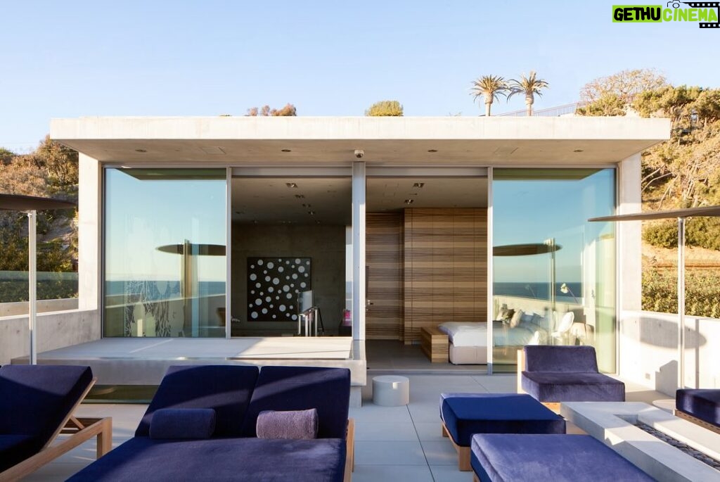Mary Fitzgerald Instagram - 🏠 🌊 Coming Soon in Malibu - 24844 Malibu Rd. - $53,000,000 An architectural tour de force and only one of the few private homes in the United States designed by the renowned Pritzker Prize-winning Japanese architect, Tadao Ando. Best known for his minimalist structures and his assured use of reinforced concrete, Ando’s trademark design of “smooth-as-silk” concrete is wholly present in the structure and surface of the home. Constructed of approximately 1,200 tons of concrete, 200 tons of steel reinforcement, and 12 massive pylons driven more than 60 feet into the sand with AD100 architecture firm Marmol Radziner acting as executive architect and general contractor, the structure is an everlasting beacon of permanence on California’s coastline. Natural light is used creatively throughout the space, another signature of Ando, to manipulate a warm feeling throughout the building and harmonize with its natural surroundings. The home spans +/- 4,000 sq. ft. of interior space and approximately 1,500 sq. ft. of outdoor decks with ocean views from every room. Currently all interior finishes have been removed from the property, and work is needed to either restore or reimagine the interiors. Thoughtfully located on the prestigious and quiet Malibu Road, with easy access and close proximity to the finest restaurants, shopping, and entertainment in all of Malibu. An exceedingly rare architectural achievement that should be seen as a masterful work of art, rather than just a residence. Listing Agent: @jasonoppenheim @theoppenheimgroup