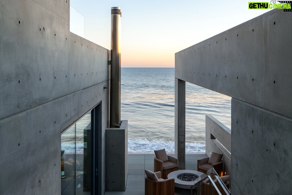 Mary Fitzgerald Instagram - 🏠 🌊 Coming Soon in Malibu - 24844 Malibu Rd. - $53,000,000 An architectural tour de force and only one of the few private homes in the United States designed by the renowned Pritzker Prize-winning Japanese architect, Tadao Ando. Best known for his minimalist structures and his assured use of reinforced concrete, Ando’s trademark design of “smooth-as-silk” concrete is wholly present in the structure and surface of the home. Constructed of approximately 1,200 tons of concrete, 200 tons of steel reinforcement, and 12 massive pylons driven more than 60 feet into the sand with AD100 architecture firm Marmol Radziner acting as executive architect and general contractor, the structure is an everlasting beacon of permanence on California’s coastline. Natural light is used creatively throughout the space, another signature of Ando, to manipulate a warm feeling throughout the building and harmonize with its natural surroundings. The home spans +/- 4,000 sq. ft. of interior space and approximately 1,500 sq. ft. of outdoor decks with ocean views from every room. Currently all interior finishes have been removed from the property, and work is needed to either restore or reimagine the interiors. Thoughtfully located on the prestigious and quiet Malibu Road, with easy access and close proximity to the finest restaurants, shopping, and entertainment in all of Malibu. An exceedingly rare architectural achievement that should be seen as a masterful work of art, rather than just a residence. Listing Agent: @jasonoppenheim @theoppenheimgroup