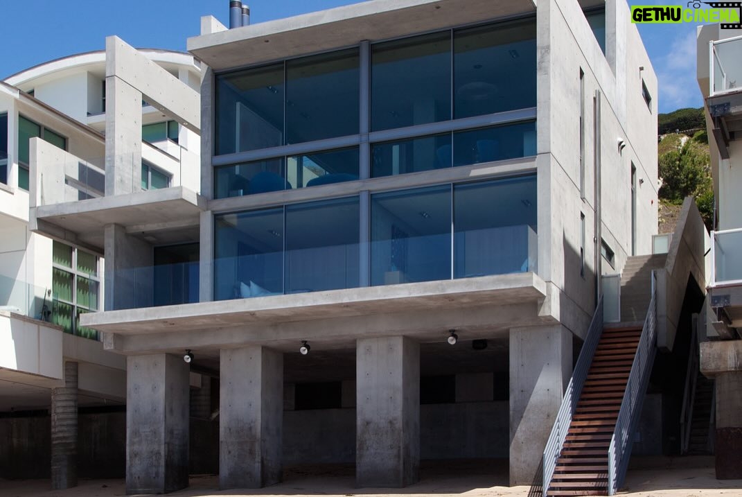 Mary Fitzgerald Instagram - 🏠 🌊 Coming Soon in Malibu - 24844 Malibu Rd. - $53,000,000 An architectural tour de force and only one of the few private homes in the United States designed by the renowned Pritzker Prize-winning Japanese architect, Tadao Ando. Best known for his minimalist structures and his assured use of reinforced concrete, Ando’s trademark design of “smooth-as-silk” concrete is wholly present in the structure and surface of the home. Constructed of approximately 1,200 tons of concrete, 200 tons of steel reinforcement, and 12 massive pylons driven more than 60 feet into the sand with AD100 architecture firm Marmol Radziner acting as executive architect and general contractor, the structure is an everlasting beacon of permanence on California’s coastline. Natural light is used creatively throughout the space, another signature of Ando, to manipulate a warm feeling throughout the building and harmonize with its natural surroundings. The home spans +/- 4,000 sq. ft. of interior space and approximately 1,500 sq. ft. of outdoor decks with ocean views from every room. Currently all interior finishes have been removed from the property, and work is needed to either restore or reimagine the interiors. Thoughtfully located on the prestigious and quiet Malibu Road, with easy access and close proximity to the finest restaurants, shopping, and entertainment in all of Malibu. An exceedingly rare architectural achievement that should be seen as a masterful work of art, rather than just a residence. Listing Agent: @jasonoppenheim @theoppenheimgroup